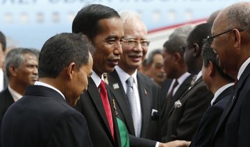 Indonesian growth at 5-year low, eyes on Widodo to deliver