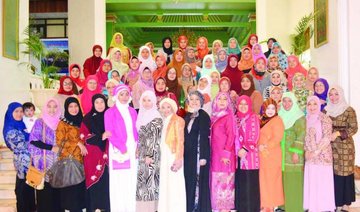 Wearing hijab in style, Indonesian women stress faith on Islamic culture