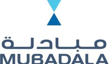 Mubadala posts sharp loss