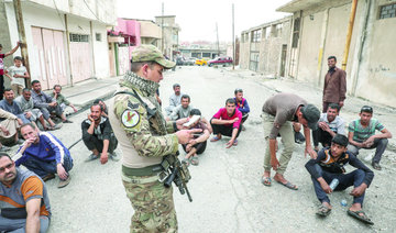 Hundreds flee Mosul fighting as others return to liberated areas