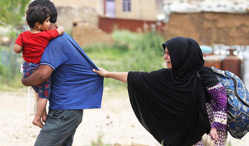 Flooding forces Iraqis to flee war in rickety boats