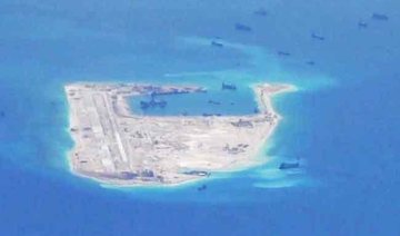 China installs rocket launchers on disputed South China Sea island