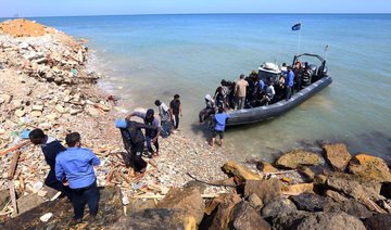 Migrants who clung to boat rescued off Libya, 7 bodies found