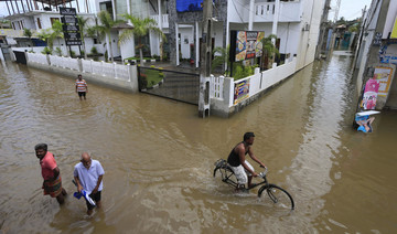 Sri Lanka races to rescue flood victims before rain resumes