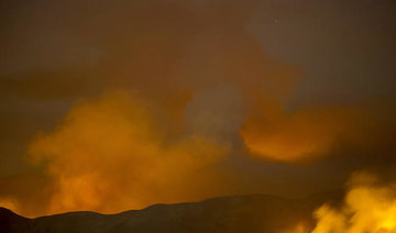 Forest fires rage in sweltering California