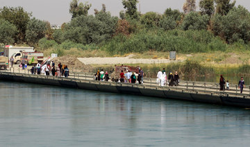 Iraqi bridge is sole link for Mosul residents rebuilding lives