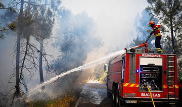 Wildfires trap 2,000 villagers in Portugal