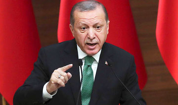 In call to Suu Kyi, Erdogan slams rising human rights violations repression