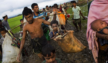 Human flood of Rohingya tell of 5-day trek to safety