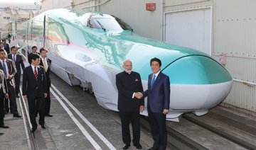 Modi, Abe get India’s first bullet train going as ties deepen