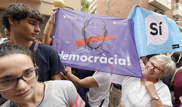 Police in Catalonia hunt for hidden ballot boxes in bid to foil referendum