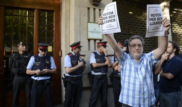 Spanish police detain Catalan official in referendum row