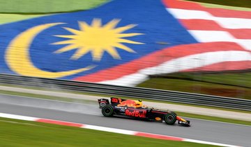 Formula One: Red Bulls’ Verstappen sets pace in rain-hit Malaysia practice