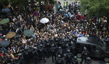 Spanish police storm polling station in Catalonia independence vote