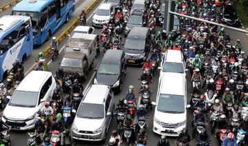 Indonesia’s notorious traffic jam forces president to walk