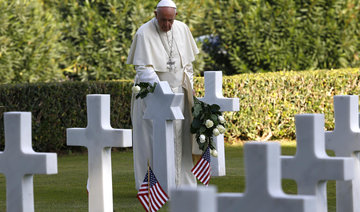 Pope, at US military cemetery, makes emotional anti-war address