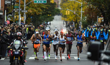 With heavy police presence, crowds come out for NYC Marathon