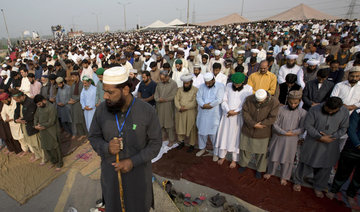 Pakistan blocks off roads into capital as blasphemy law supporters stage sit-in