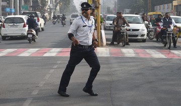 À la Michael Jackson: India’s ‘moonwalking’ traffic cop turns heads