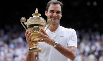 Year in review: Federer rolls on as Woods seeks Majors