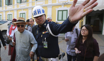 Thai court drops lese majeste charges against academic