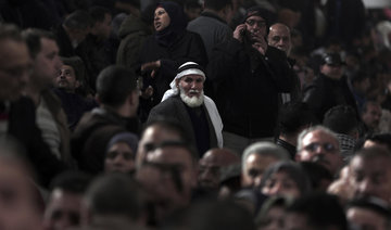 Thousands of Palestinians jam Gaza border, temporarily opened by Egypt