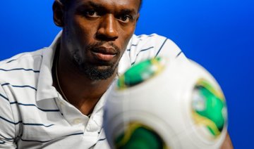 Usain Bolt signs up with football club... for a charity match