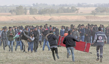 Abbas calls on UN to protect Palestinians after Israeli troops kill 16 protesters