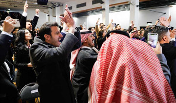 The Saudi Royal Commission for Riyadh City celebrates winning the 2030 World Expo bid in Paris on Nov. 28, 2023. (AFP)