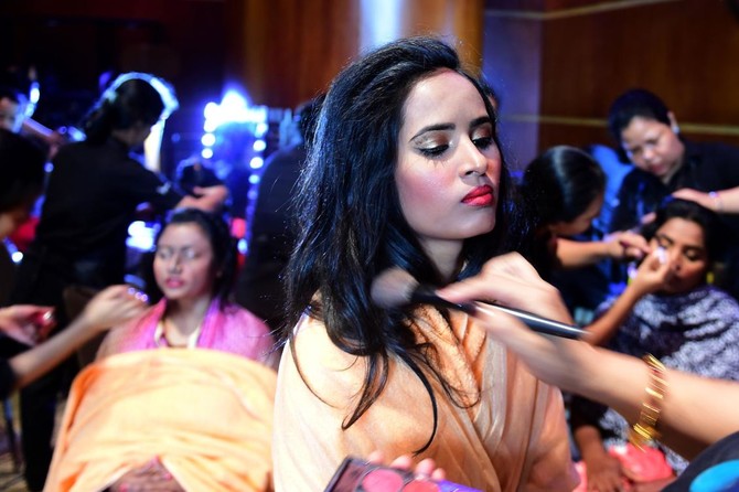 Acid victims redefine beauty in Bangladesh fashion show