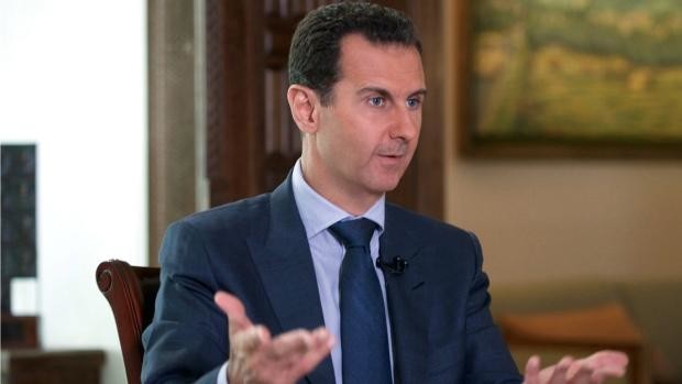 Assad speaks with Iran’s president, who affirms support