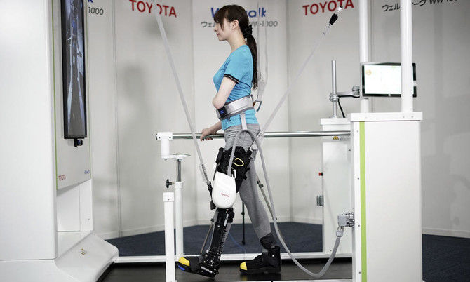 Toyota shows robotic leg brace to help paralyzed people walk