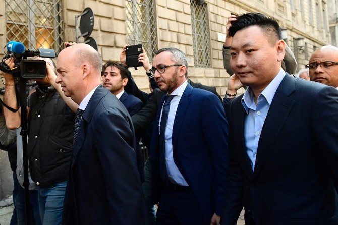 End of Berlusconi era as Chinese group buys AC Milan