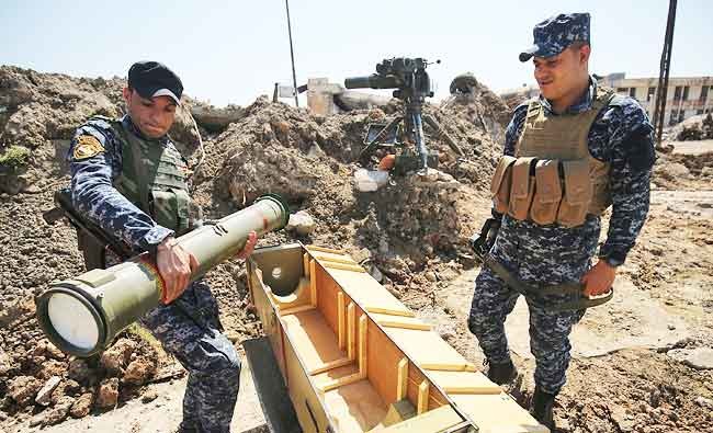 Patrolling western Mosul a weary grind for Iraqi police