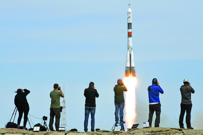 Russian, American two-man crew blasts off to ISS