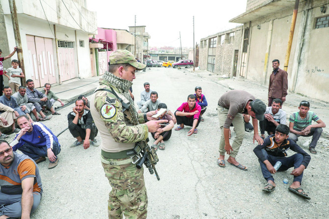 Hundreds flee Mosul fighting as others return to liberated areas