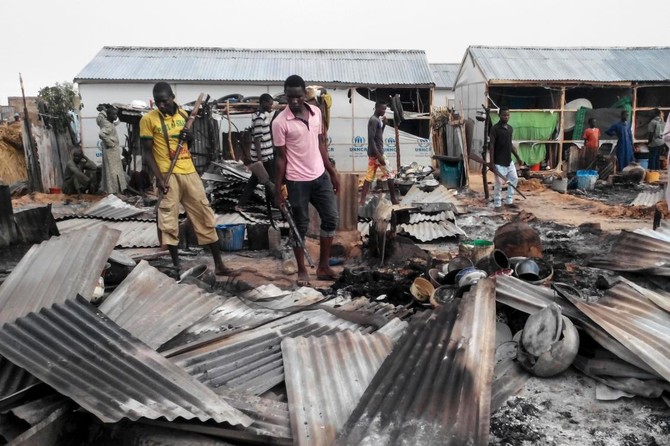 Boko Haram attack on Nigerian city of Maiduguri kills 14 people, say police