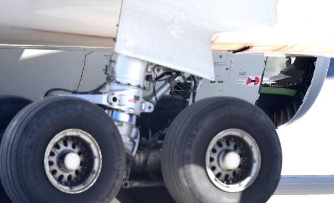 China Eastern plane makes emergency landing in Sydney with hole in casing