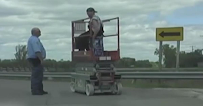 VIDEO: Police chase man driving a scissor lift