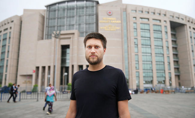 Turkey court rules to keep six rights activists in custody