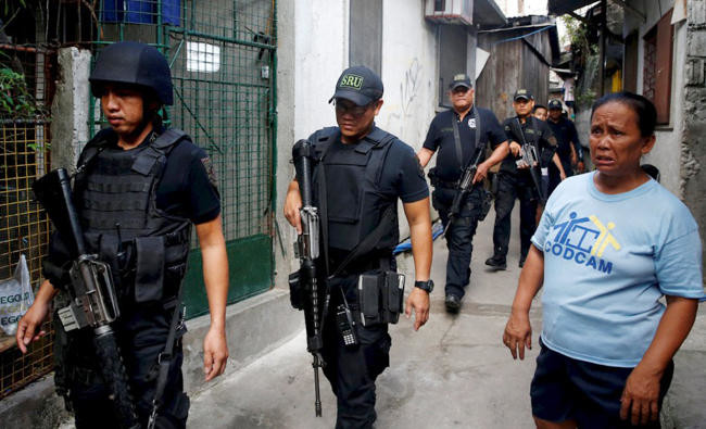 Philippine mayor, wife among 14 killed in drugs-linked raid