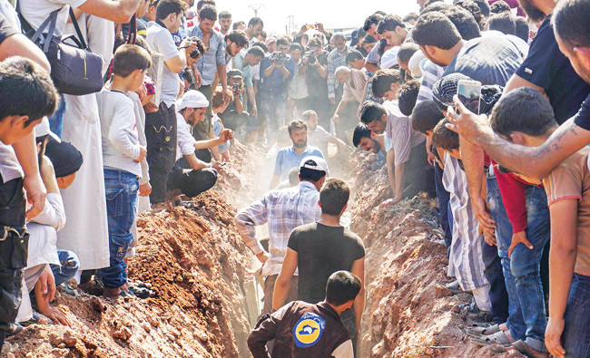 ‘Ugly crime’: 7 White Helmet members gunned down in Syria