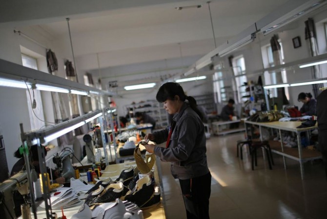 North Korean factories humming with ‘Made in China’ clothes