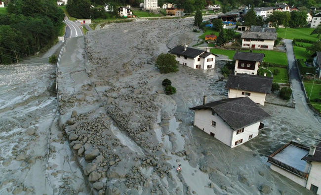 Eight missing after huge landslide in Swiss Alps