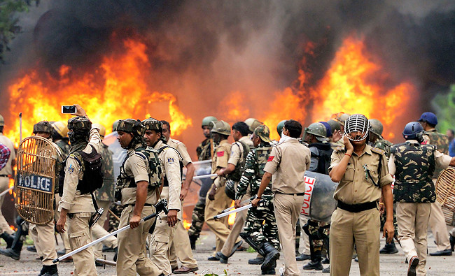 30 dead after Indian guru’s rape conviction triggers riots