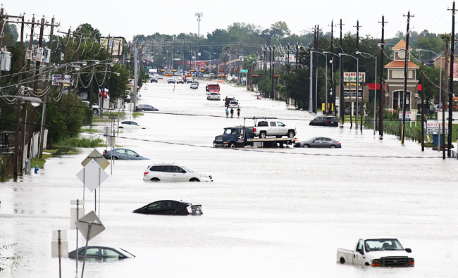 Harvey moves into Louisiana, with at least 25 dead, 17 missing