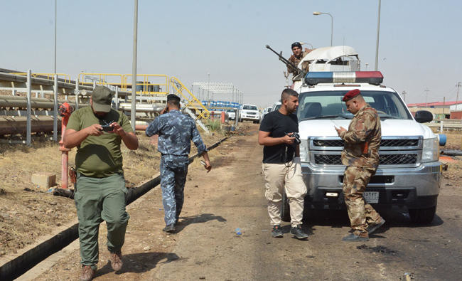 Suicide bombers kill 7 in attack on Iraq power plant