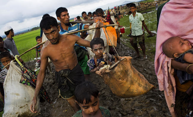 Human flood of Rohingya tell of 5-day trek to safety