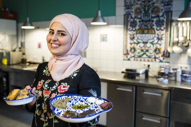 Voyage of discovery: From fleeing Syria to dazzling Merkel in the kitchen