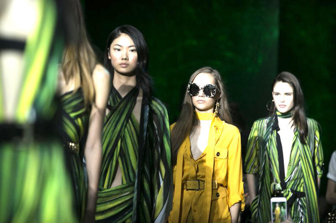 Amazonian color, dramatic silhouettes hit the Paris runways